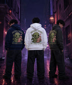 Three people in navy, white, and gray hoodies with Cthulhu graphic standing in a moody alley lit by purple and pink glow.