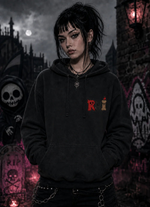 Person in gothic graveyard scene wearing black hoodie with dripping RWI design, standing amid moonlight, graffiti and red lantern glow