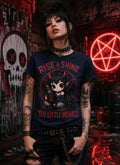 Person in punk outfit wearing chibi horror T‑shirt, standing in dark graffiti scene with red neon symbol and gothic décor